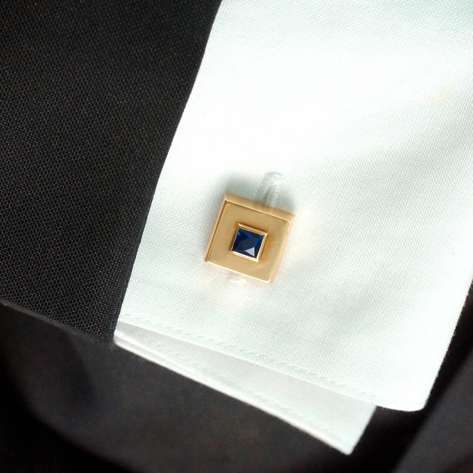 Circa 1950s, 18k, by Mellerio, Paris, France. These eighteen-karat gold cufflinks from the renowned house of Mellerio are set with superb navy blue French-cut sapphires. Their style is impeccably Parisian and their fabrication exquisite. Excellent