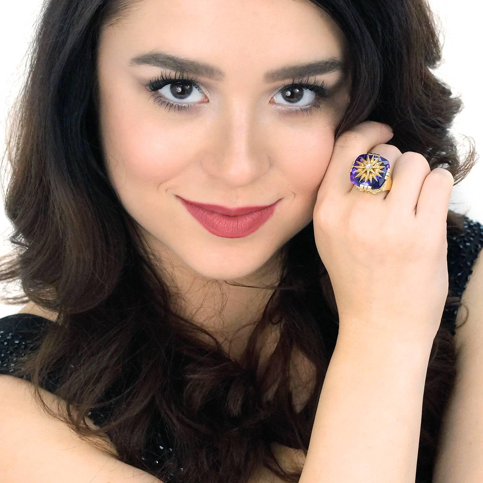 Lawrence Jeffrey Alchemy Collection.  This ring is a fashionable marriage of antique elements. Its stylish pierced gallery and deeply hued amethyst is beautifully finished by a striking diamond-set Victorian star-on-star. Blending the old world with