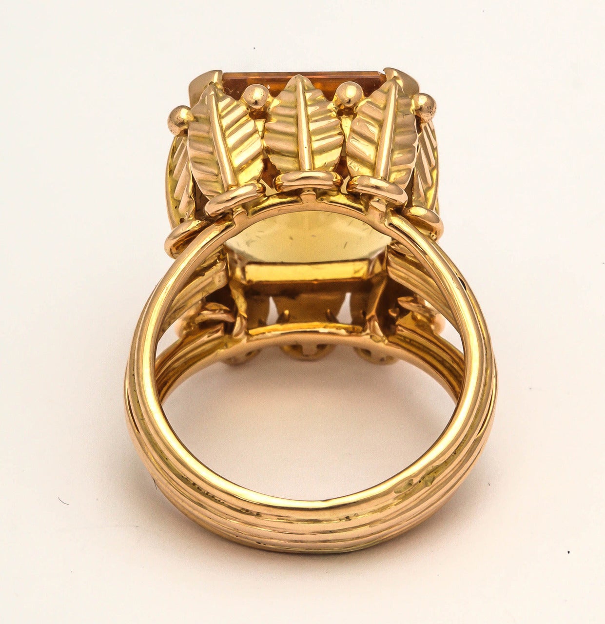 Elegant 1970s French citrine statement ring, the 18k gold mount designed as a row of wheat sheaves, ancient symbol of prosperity, set with a rectangular-cut citrine with canted corners.

Paris, France, hallmarked.

Size 6 1/4

