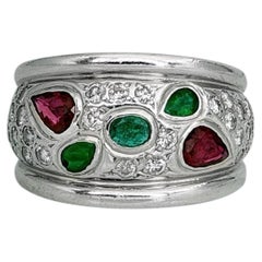 Vintage 18 Karat Gold 0.30 Carat Emerald 0.70 Carat Ruby 0.58 Carat Diamond Ring