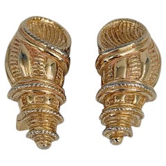 Pendientes de clip vintage de Christian Dior de los años 90, con forma de concha y tono dorado