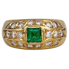 Vintage 18 Karat Gold 0.55 Carat Emerald 0.70 Carat VS Diamond Wide Band Ring