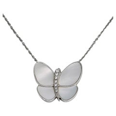Modern Van Cleef & Arpels 18 Karat Gold Diamond White Butterfly Pendant Necklace