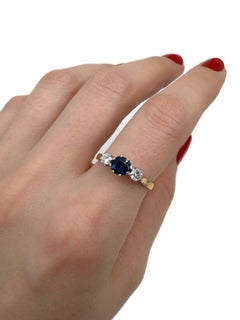 Vintage 18 Karat Gold 0.85 Carat Sapphire 0.26 Carat Diamond Three-Stone Ring
