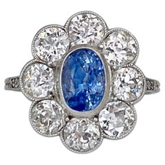 Edwardian 950 Platinum 1.30 Carat SI Sapphire 3.30 Carat Diamond Cluster Ring