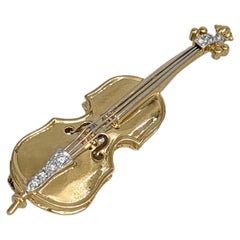 Vintage-Brosche in Cello-Form aus 18-Karat-Gold mit Diamanten