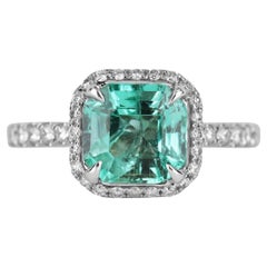 2.75tcw 18K Emerald & Diamond Halo Ring