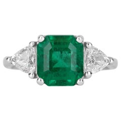 2.80tcw Plat Three Stone Emerald & Diamond Trillion Platinum Ring