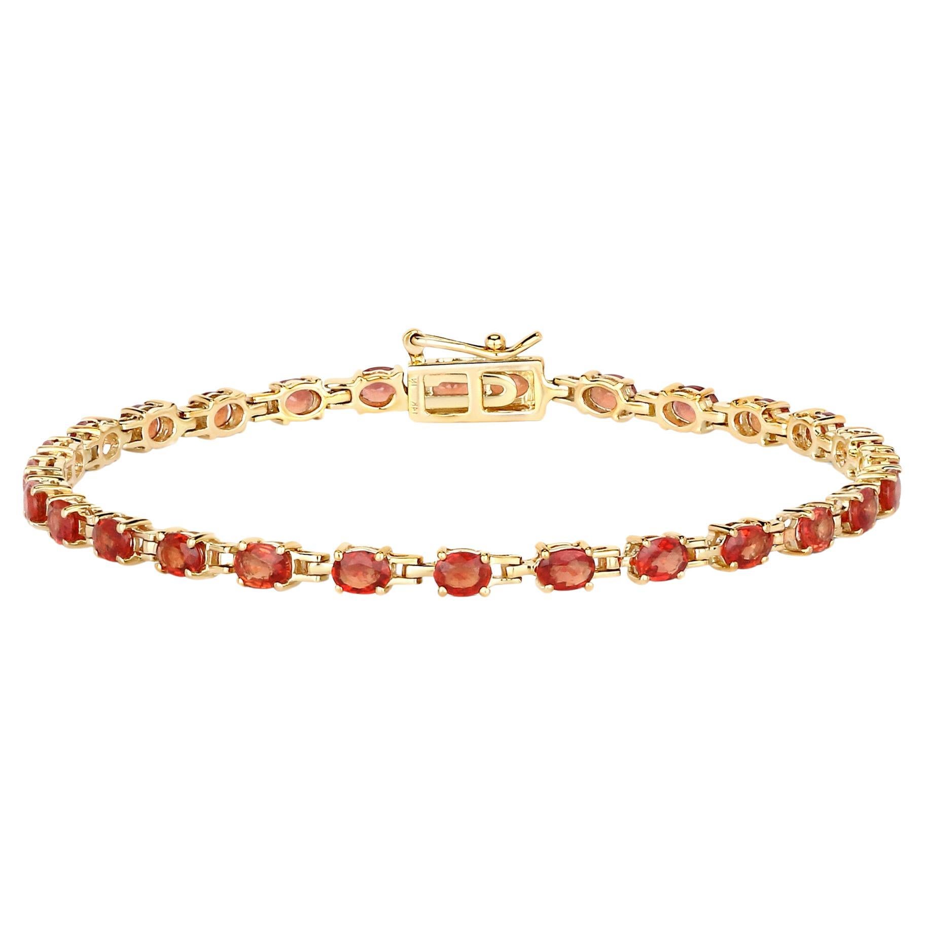 Stupendo bracciale tennis con zaffiro rosso naturale arancione da 7 carati in oro giallo 14 carati