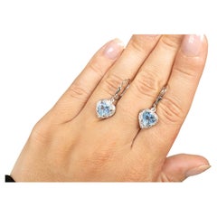 Pendants d'oreilles en forme de cœurs en topaze bleue suisse de 4,2 carats