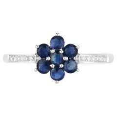 Anello con zaffiro blu e diamanti da 0,56 carati in oro bianco 14K