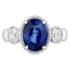 Blue Sapphire Ring With Diamonds 3.54 Carats 18K White Gold
