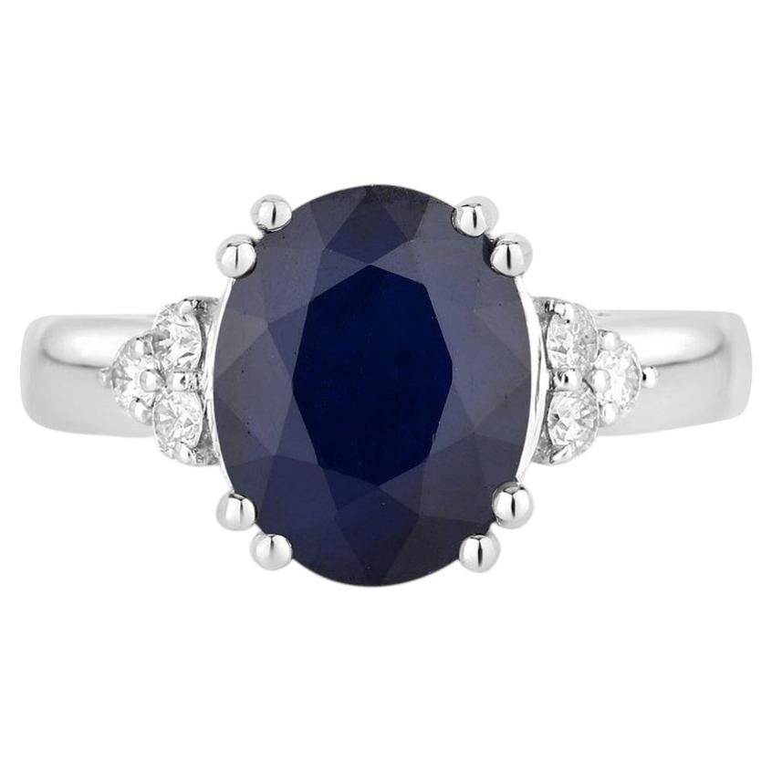 Blue Sapphire Ring With Diamonds 4.46 Carats 14K White Gold For Sale