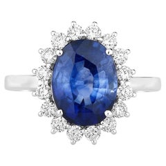 Blue Sapphire Ring With Diamonds 4.5 Carats 18K White Gold