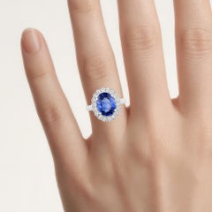 Blue Sapphire Ring With Diamonds 4.06 Carats 18K White Gold