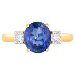 Bague en saphir bleu sertie de diamants, 2,7 carats, en or jaune 18 carats
