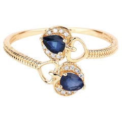 Ring mit blauem Saphir und Diamanten (0,3 Karat) aus 14-karätigem Gelbgold