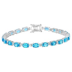 Schweizer Blauer Topas-Tennisarmband aus Sterlingsilber 10.7 Karat