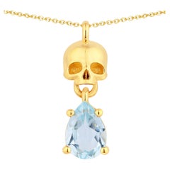 Blue Topaz Skull Pendant 0.84 Carats Gold Plated Silver