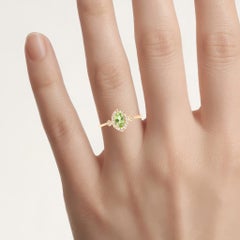 Peridot-Ring mit Diamanten, 0,45 Karat, 10-karätiges Gelbgold