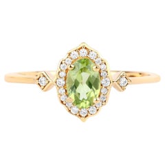 Peridot-Ring mit Diamanten, 0,45 Karat, 10-karätiges Gelbgold