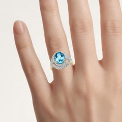Swiss Blue Topaz Ring 3.24 Carats Gold Plated Silver
