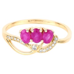 Ruby Knot Ring With Diamonds 0.68 Carats 14K Yellow Gold
