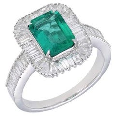 Natural emerald octagon cut diamond ring gold  Diamond baguette prong set