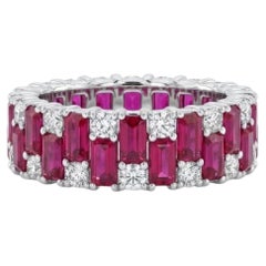 Bague halo en or 18 carats naturel sertie d'un rubis et de diamants totalisant 0,39 ct