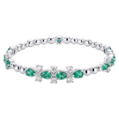 Elegante bracciale in oro 18 carati con smeraldi e diamanti, 1,13 ct e 0,67 ct