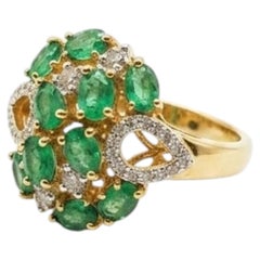 Bague « halo » en or 18 carats naturel sertie d'une émeraude et de diamants de 0,21 carat, neuve
