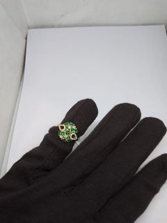 Bague « halo » en or 18 carats naturel sertie d'une émeraude et de diamants de 0,21 carat, neuve