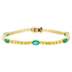 Pulsera tipo tenis nueva de oro de 18 quilates con un zafiro amarillo de 6 quilates y una esmeralda de 2,6 quilates