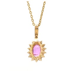 14K Gold Pendant, 1.54ct Pink Sapphire, 0.53ct Diamonds