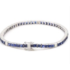 Pulsera de oro amarillo de 14 quilates con un zafiro azul de 8 quilates y diamantes de 0,55 quilates