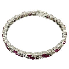 Eleganter Armreif aus 14-karätigem Gold mit einem Rubin (7,01) und Diamanten (2,35 ct), neues Design