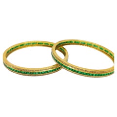 Eleganter Armreif aus 18-karätigem Gold mit einem Diamanten von 4,78 Karat und einem Smaragd von 16,52 Karat
