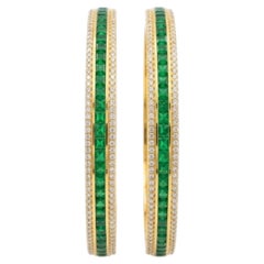 Elegant 18K Gold Bangle with 4.78ct Diamond & 16.52ct Emerald
