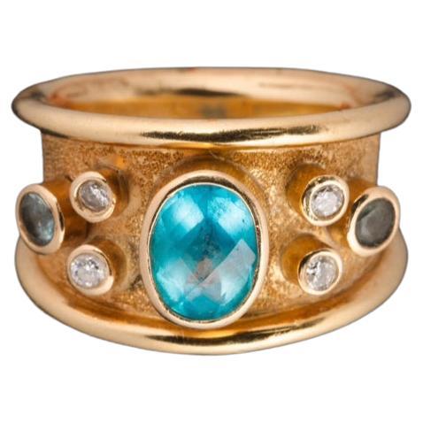 Im Angebot: Blauer Bonbon-Ring aus 18k Gold mit Aquamarin und Diamanten ()