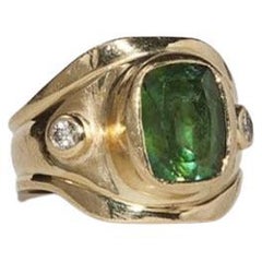 Antique Master Piece Emerald Ring with Two Diamonds