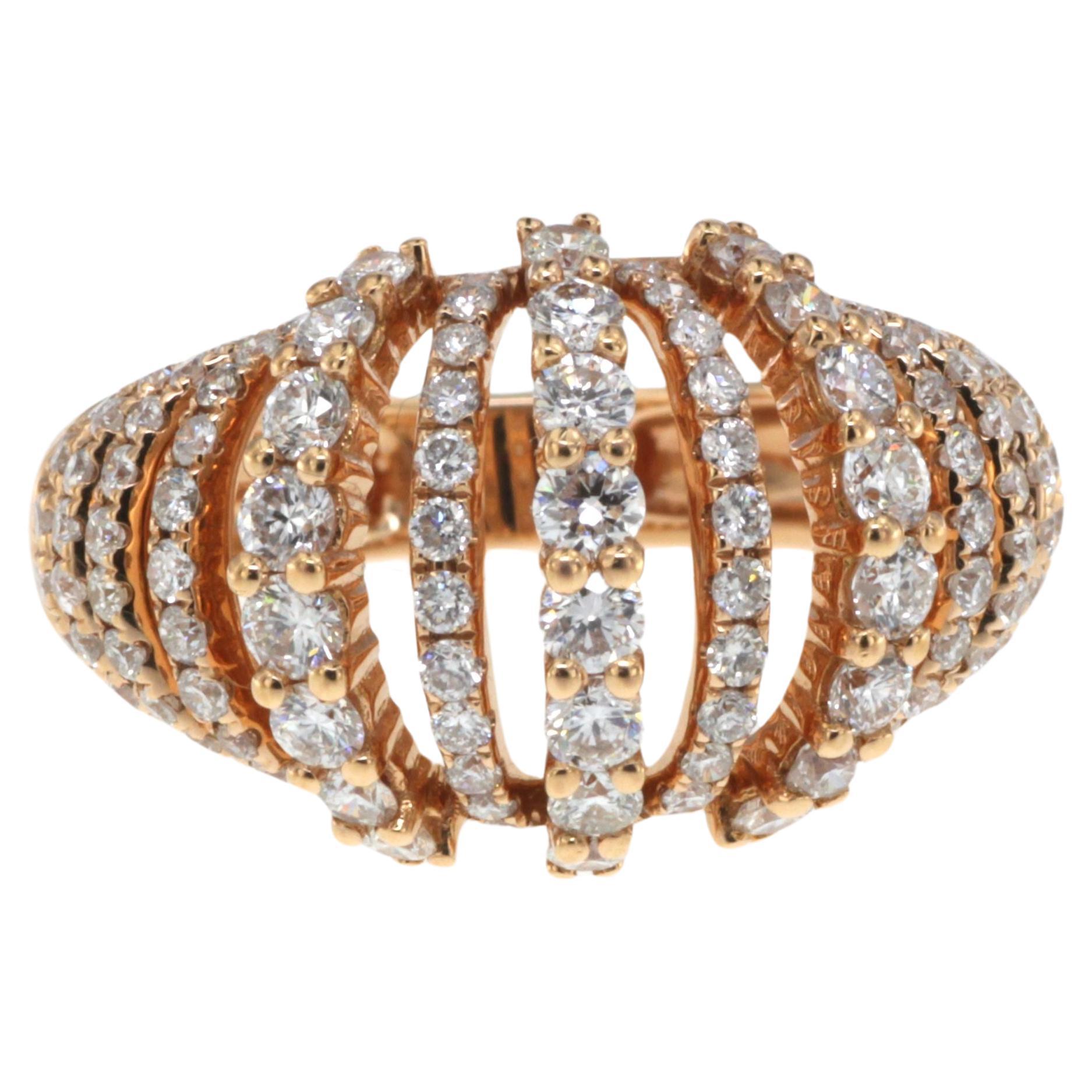 The ring in the image you've provided is a remarkable example of a diamond dome ring, featuring 1.64 carats of diamonds set in an 18K rose gold band. The design is characterized by its dome shape, which provides a generous canvas for the display of