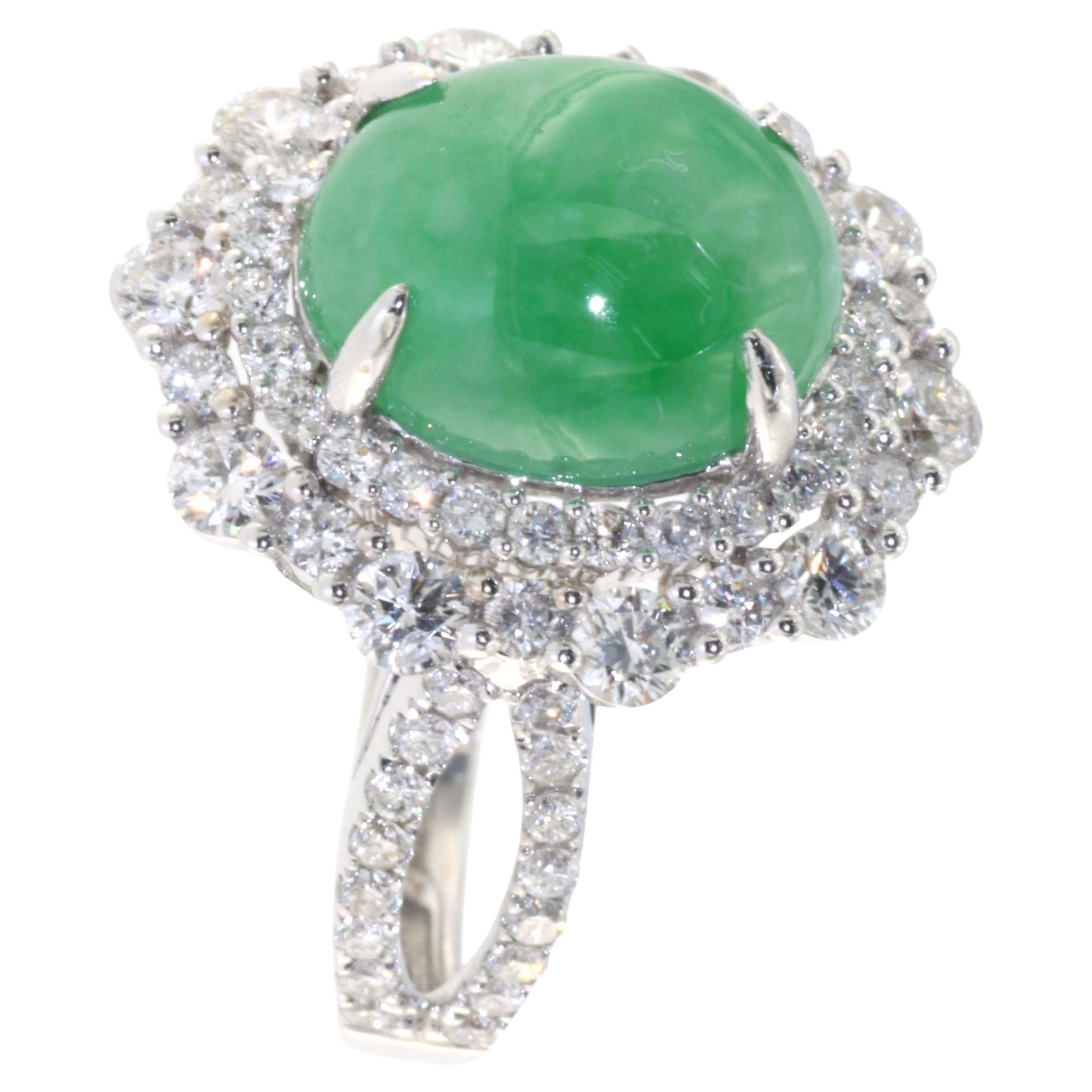Introducing our Timeless style Jadeite and Diamond Ring in 18 Karat White Gold. This exquisite ring combines the allure of jadeite and the brilliance of diamonds, creating a stunning piece that exudes elegance and sophistication. The main stone of