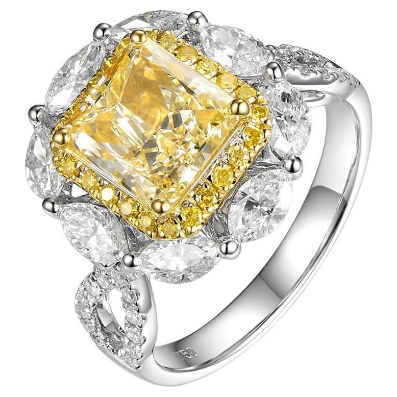 IGI Certified 3.65 Total Carat Fancy Light Yellow Diamond in 18K White Gold For Sale