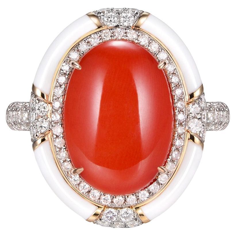 The 6.9ct Coral Diamond Enamel Ring, elegantly crafted in 18 Karat Yellow Gold, is a breathtaking ode to nature's splendor and the refined craftsmanship of human artistry. The centerpiece, a luscious 6.9 carat coral, demands attention with its rich,