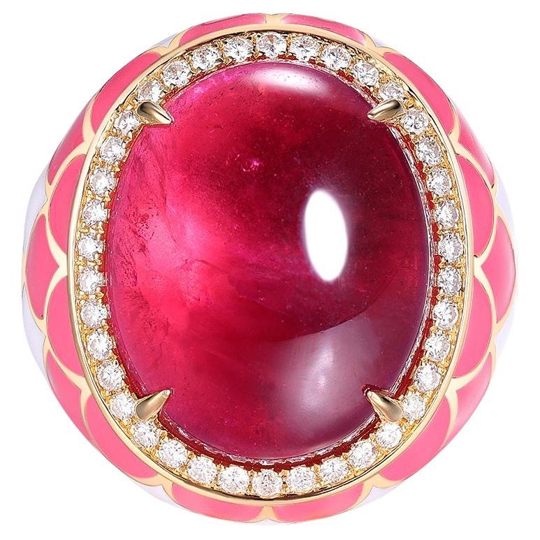 This luxurious 18K yellow gold ring showcases a striking 19.84-carat cabochon tourmaline at its center, surrounded by 0.38 carat of natural diamonds. The vibrant pink and white enamel detailing adds a playful yet elegant touch, beautifully