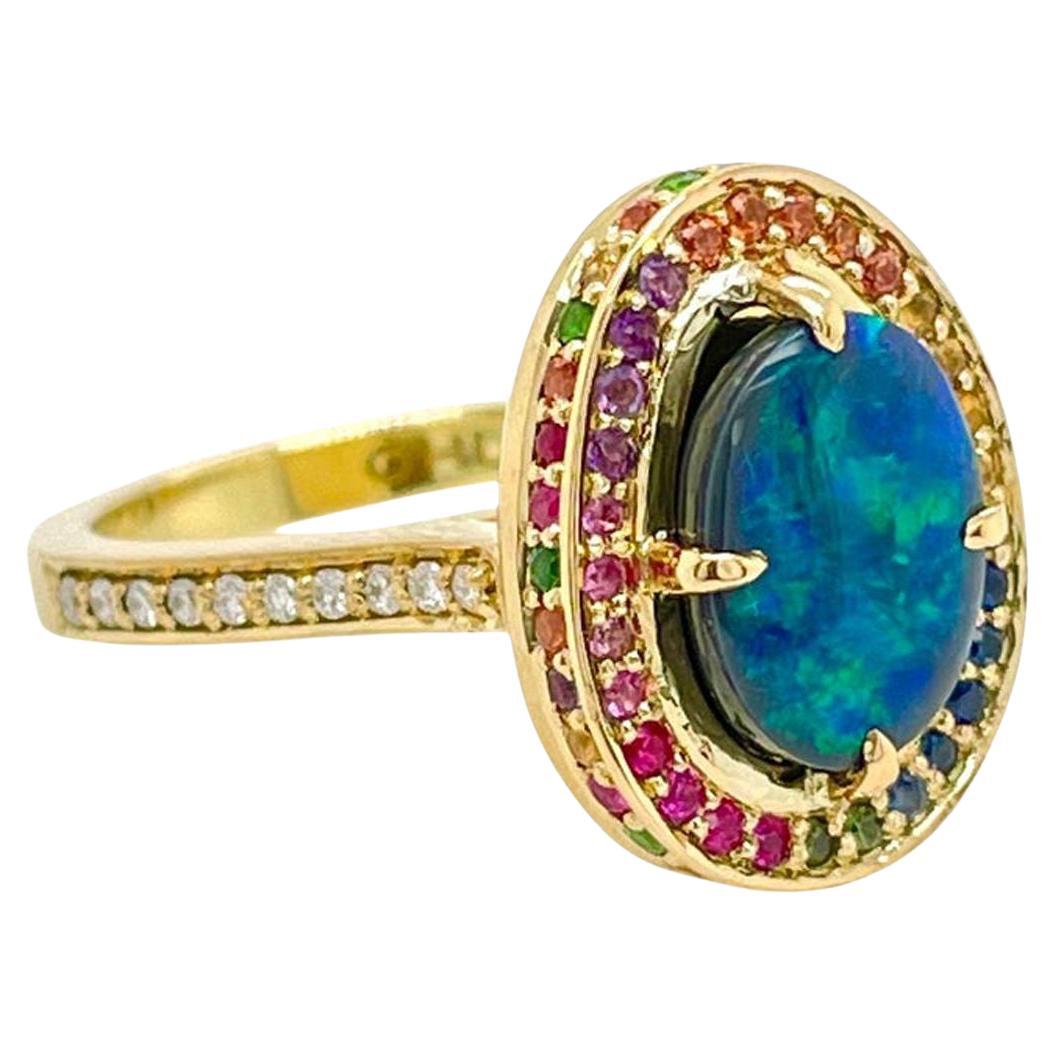 Bague en or 18ct avec opale arc-en-ciel