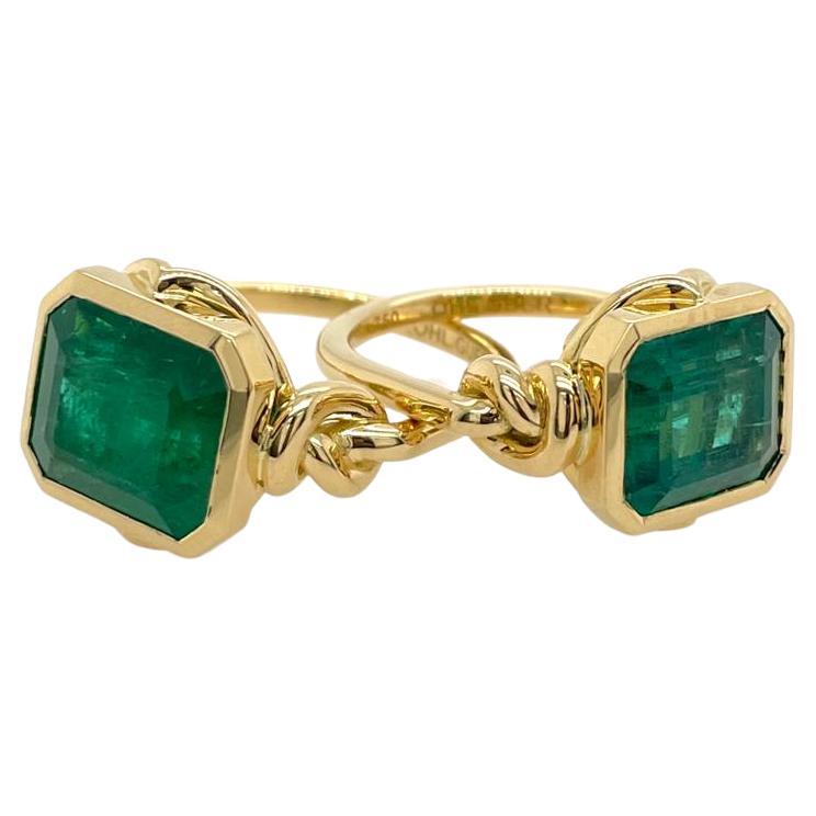 Custom made * 

Forget me knot style ring featuring a natural 3ct Natural emerald set in 18ct yellow gold

Made to order to your finger size contact our designer to hand select your emerald.