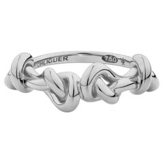 Anello "Forget Me Knot" con doppio nodo in oro bianco 18 carati del designer Ohliguer