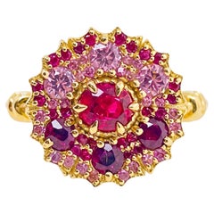 Custom 18ct Yellow Gold Ruby and Pink Sapphire Daisy Knot Ring by OHLIGUER