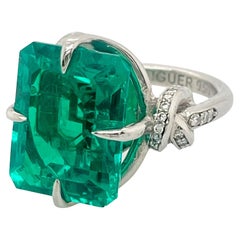 8ct Emerald Forget Me Knot Ring in Platinum and Diamonds Solitaire